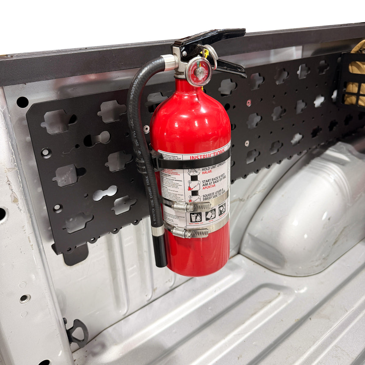 Fire Extinguisher Mount, installed on a MOBUL panel in an F-150 bed.
