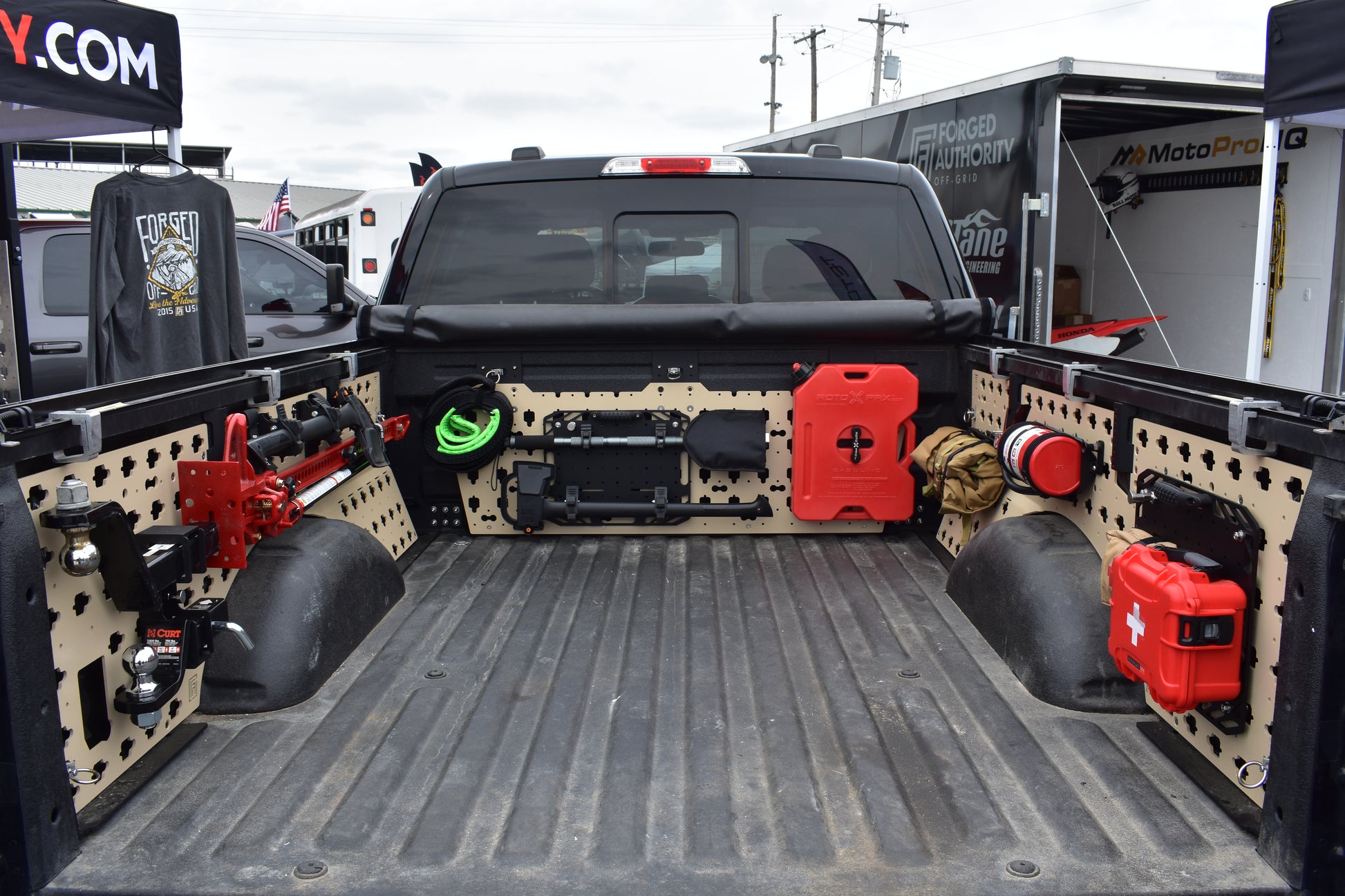 Forged Authority MOBUL F-150 Front Side Panel, used to securely store tools and gear in your truck bed, featuring our Fire Extinguisher / Tool Roll (FETR), Tool board, RotoPax Adapter, HiLift Mount, QuikFist Mounts, and Hitch Holders.
