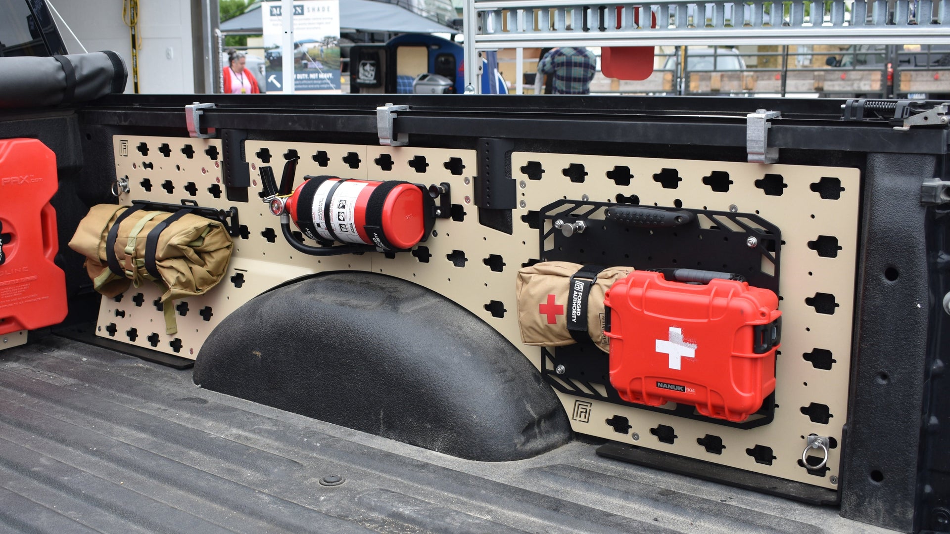 Forged Authority MOBUL F-150 Side Panels Tan with Fire Extinguisher / Tool Rolls (FETR), Forged Authority Tool Board with First Aid Kit, and Header Panel with Forged Authority RotoPax Adapter.