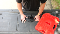 Forged Authority RotoPax Adapter for 1 Gallon RotoPax Gasoline Container on truck bed.