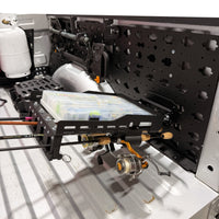 MOBUL Fishing Rod Holder, with tackle tray and reels on a MOBUL panel in a truck bed.